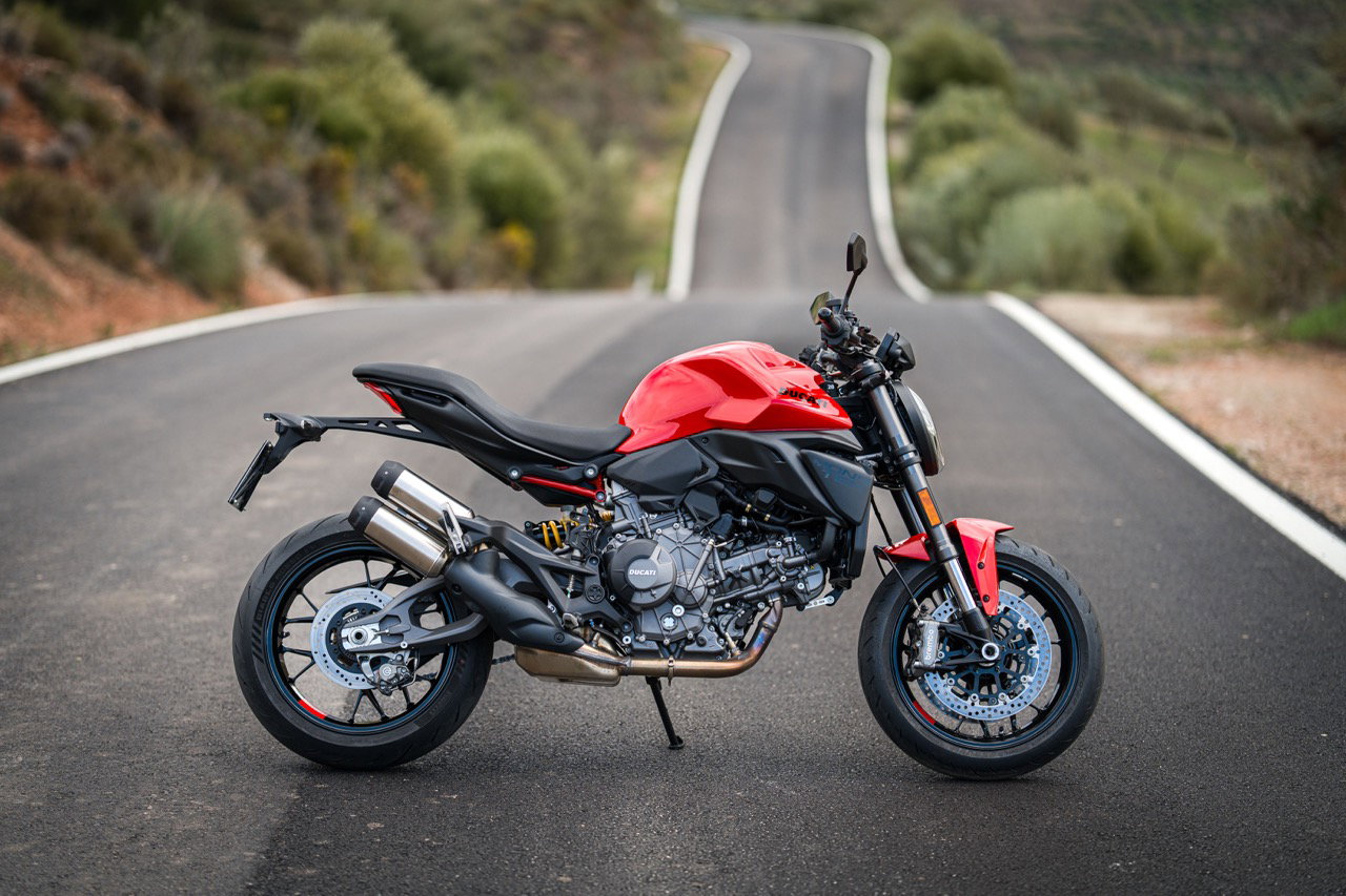 The 2026 Ducati Monster V2 in a red colour.