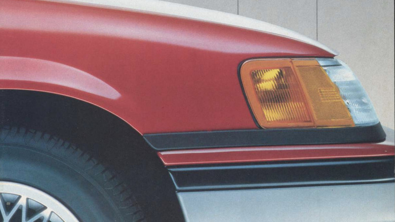 A close up of the 1987 Ford Taurus headlight