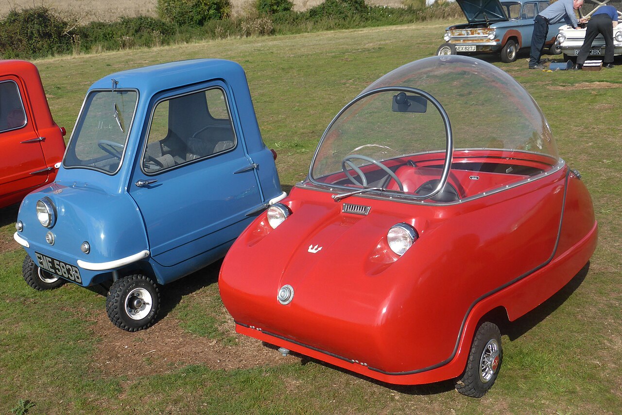Açıklama: Peel P50 next to its successor, the Peel Trident