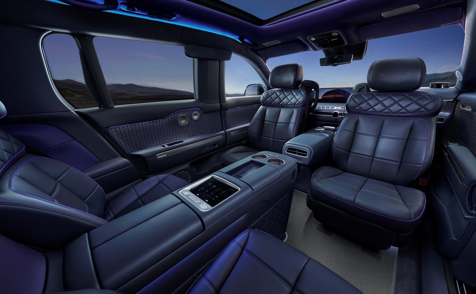 Luxurious interior of a high-end vehicle featuring plush leather seats and modern technology.