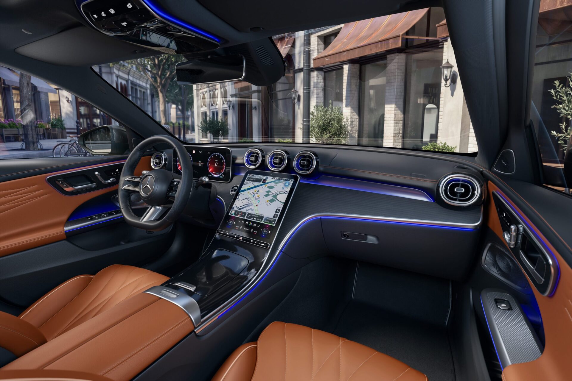 Interior of a luxury car featuring brown leather seats, a large touchscreen display, and modern dashboard design. Interior of a luxury car featuring brown leather seats, a large touchscreen display, and modern dashboard design.