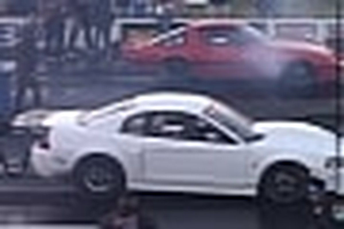 Mind-Bending Six-Second Drag Race Pits a Rotary Mazda RX-7 Against a Turbo Ford Mustang Cobra