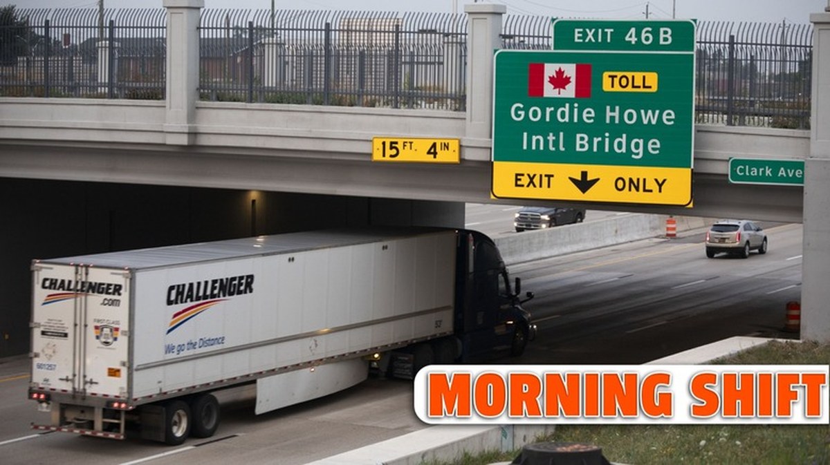 A truck heads towards the Gordie Howe International Bridge