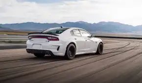 2022 Dodge Charger SRT Hellcat Redeye Widebody White Rear Angled View Track Driving