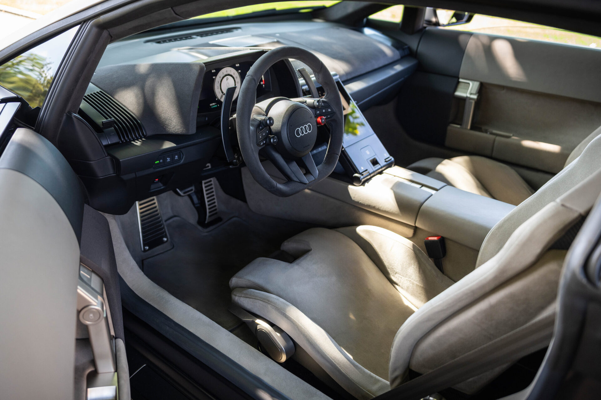 Interior view of a modern Audi car showcasing a sleek dashboard and comfortable seating.