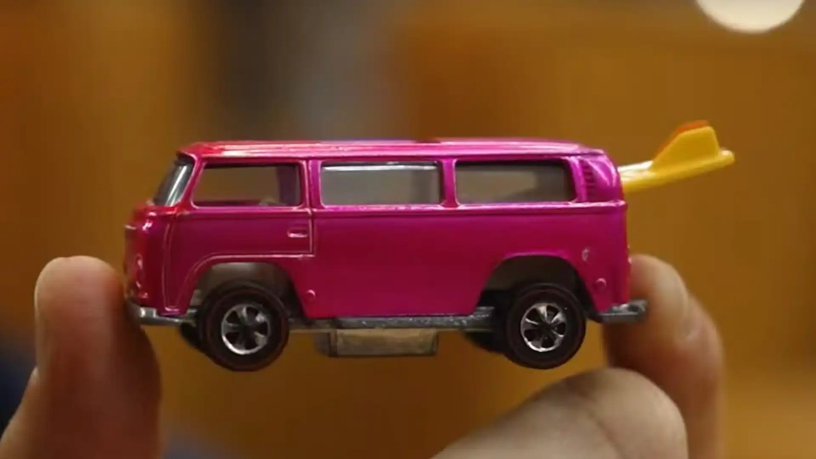1969 Pink Rear-Loader Beach Bomb side in hands