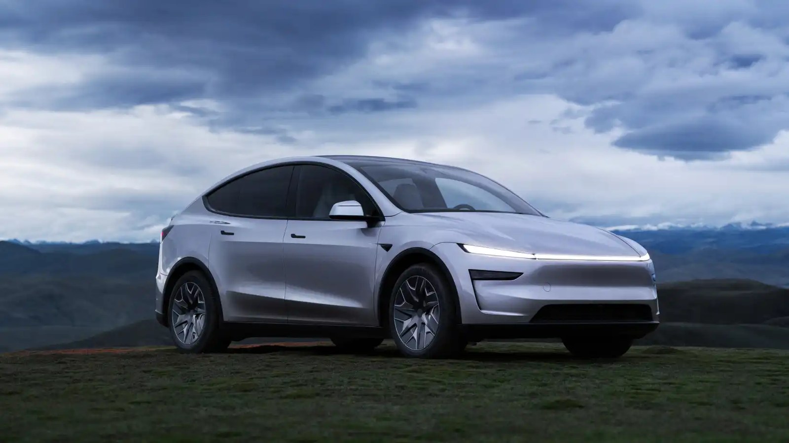North America-spec Tesla Model Y L front three-quarter view (4)