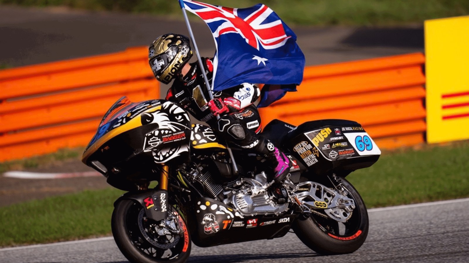 Archie McDonald riding a Harley-Davidson bagger in Austria.