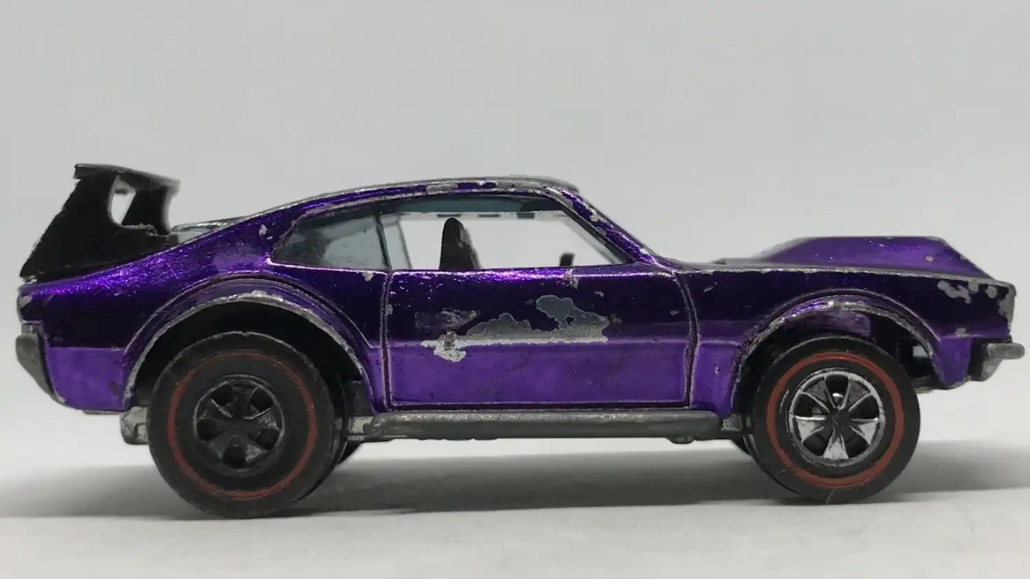 1970 Hot Wheels Mighty Maverick side facing right purple