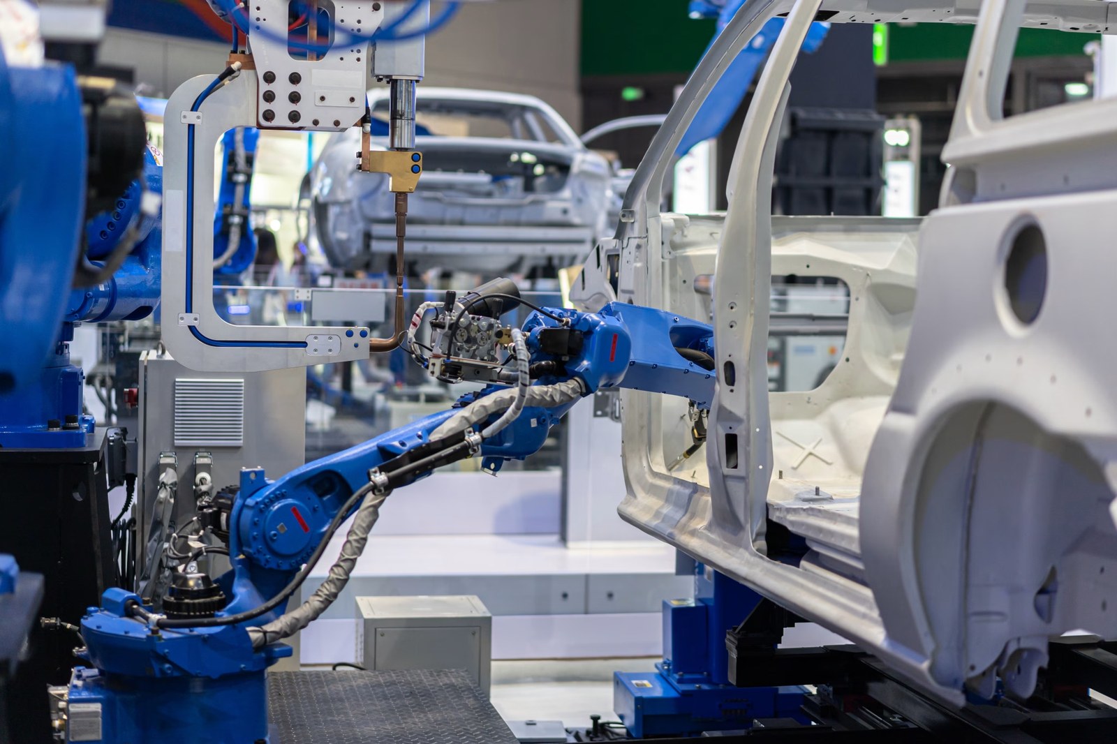 robot arm working in factory Kenya opposes EAC vehicle assembly rules delay, questions over local content, manufacturing investment and automotive aftermarket growth