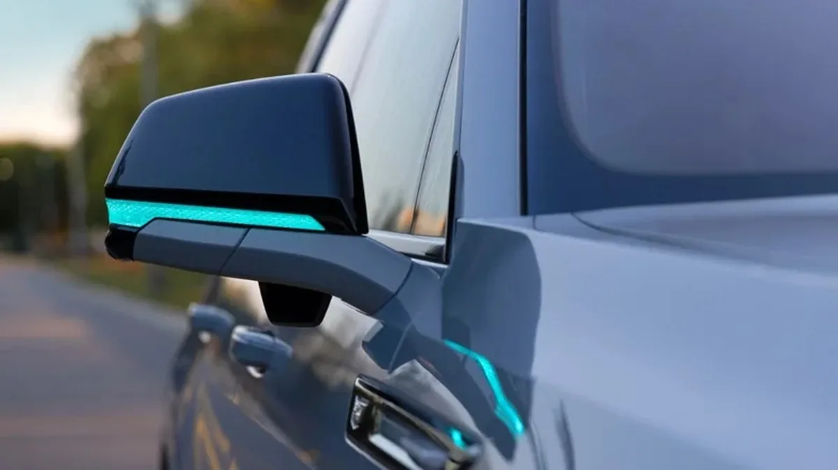 Close-up of a mirror of an autonomous Cadillac Escalade IQ