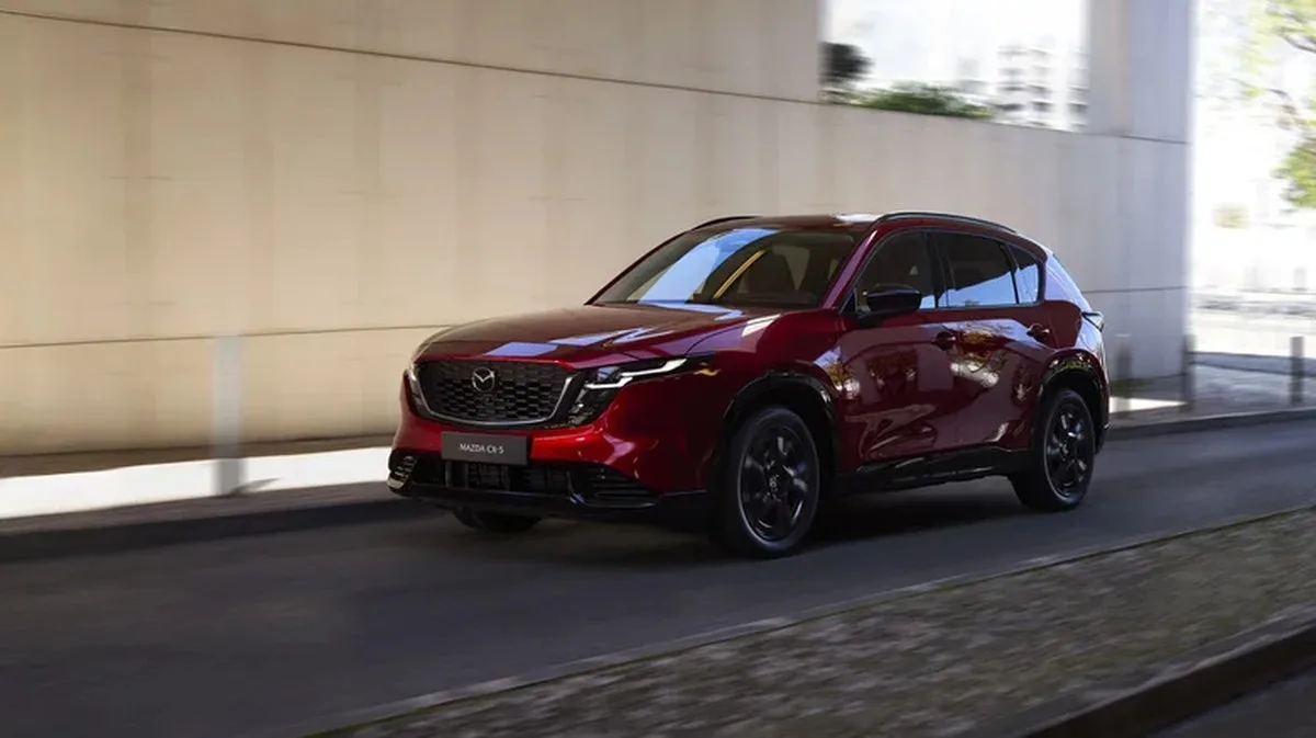 Soul Red Crystal Mazda CX-5 crossover driving.