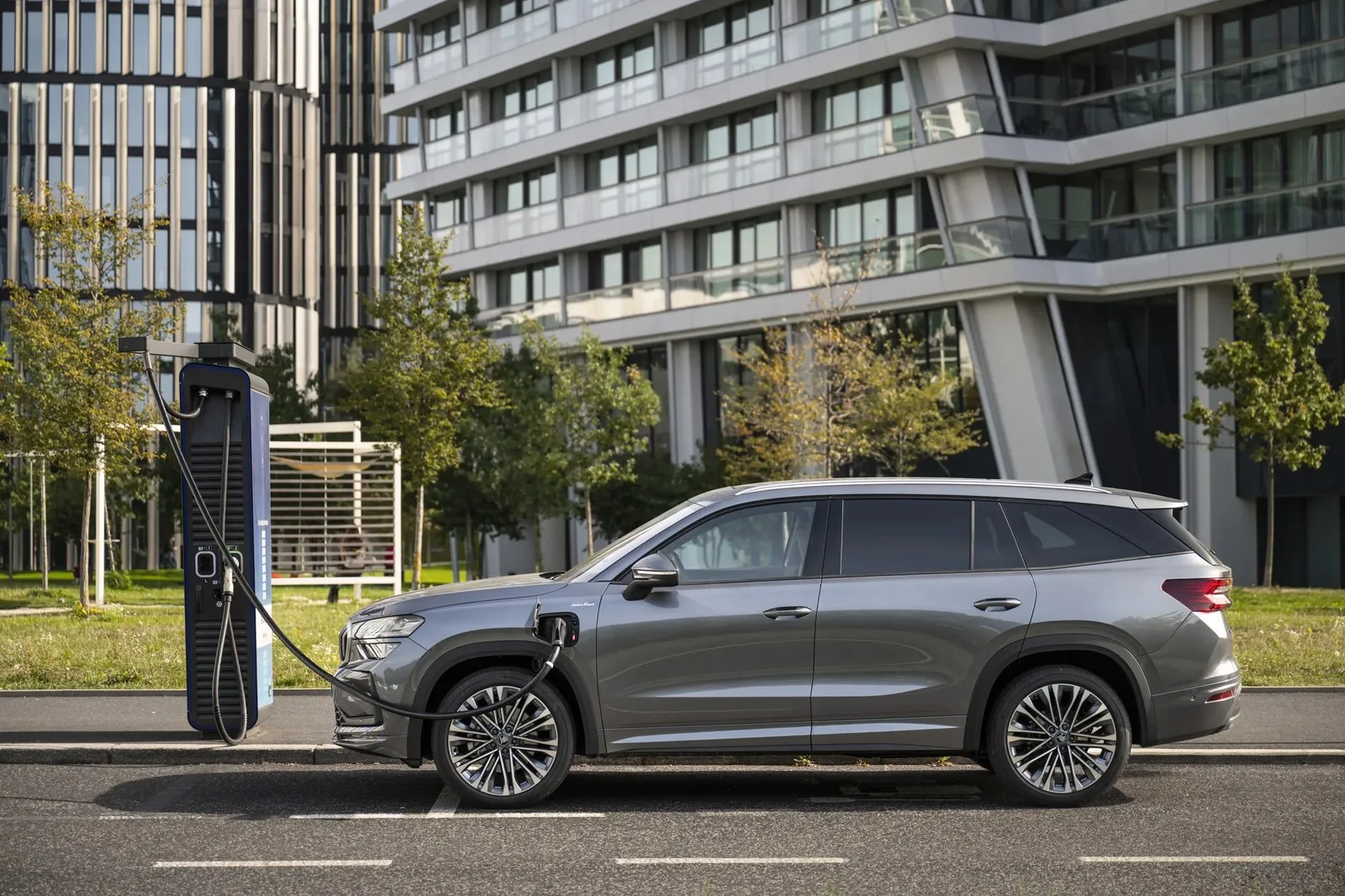 Official Kodiaq plug-in hybrid charging photograph accompanying the new range announcement.