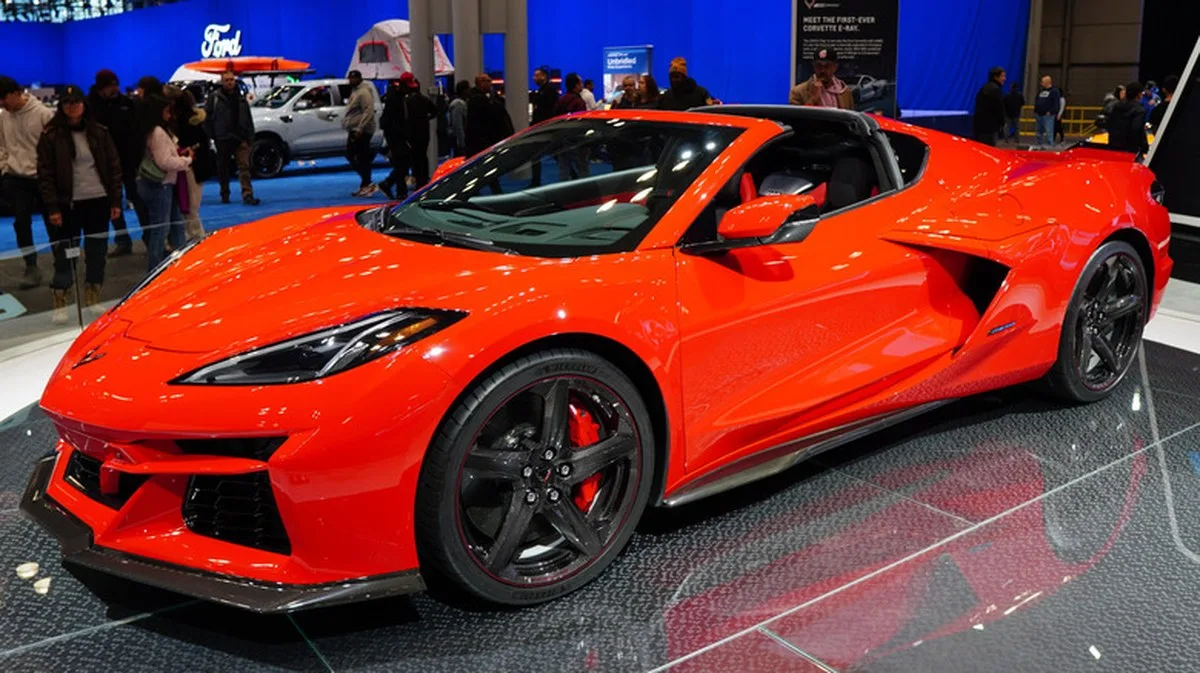 Red Corvette E-Ray at an auto show