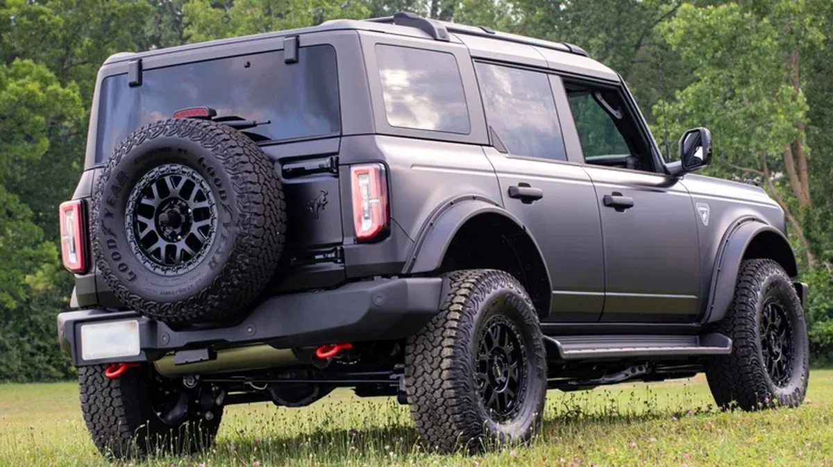 A matte black Ford Bronco with the ORV Package rear 3/4