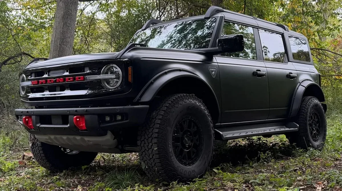 A matte black Ford Bronco with the ORV Package front 3/4